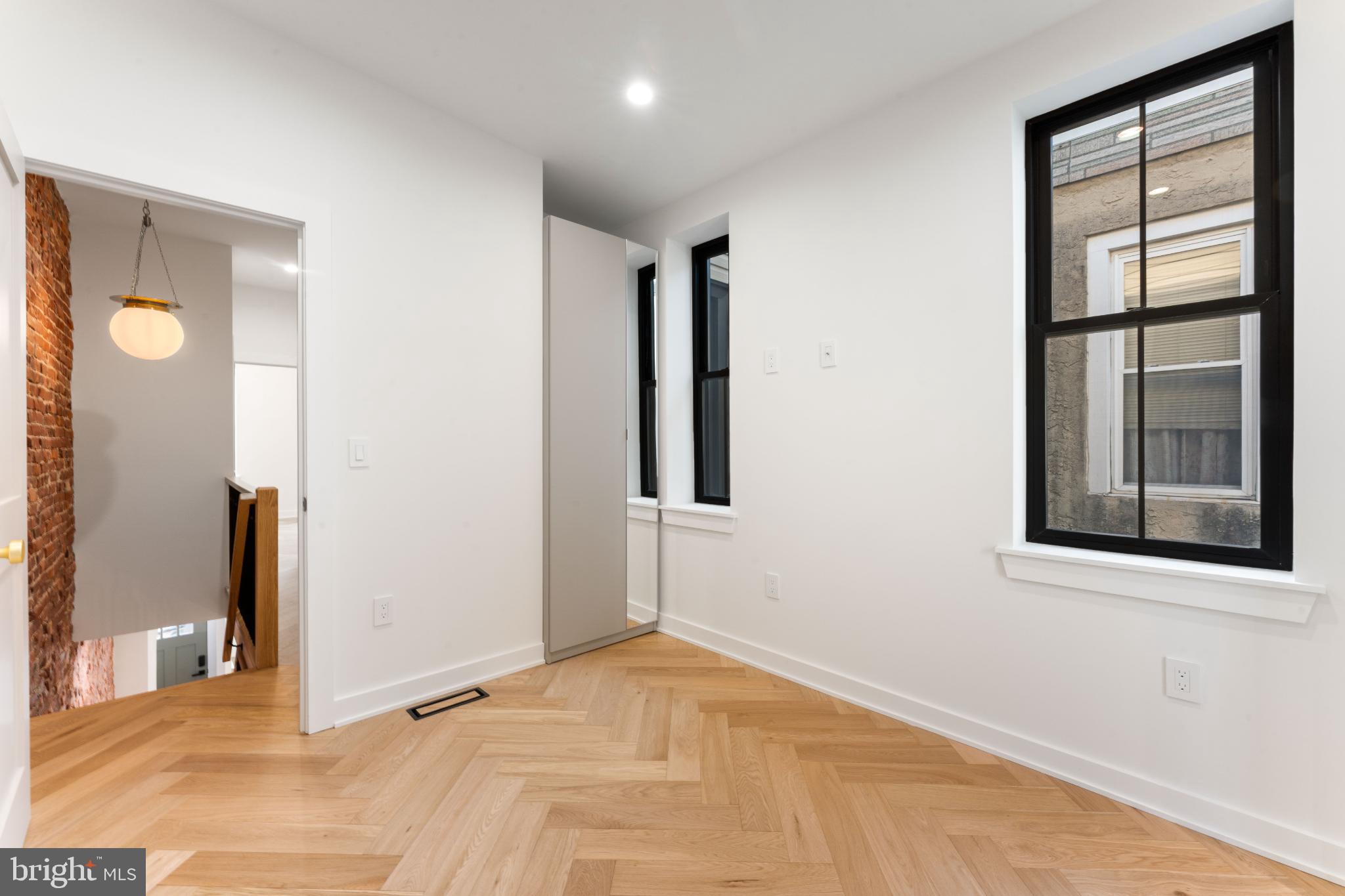823 Mercer Street Philadelphia, PA 19125 - Photo 32 of 37 a view of an empty room with window and bathroom