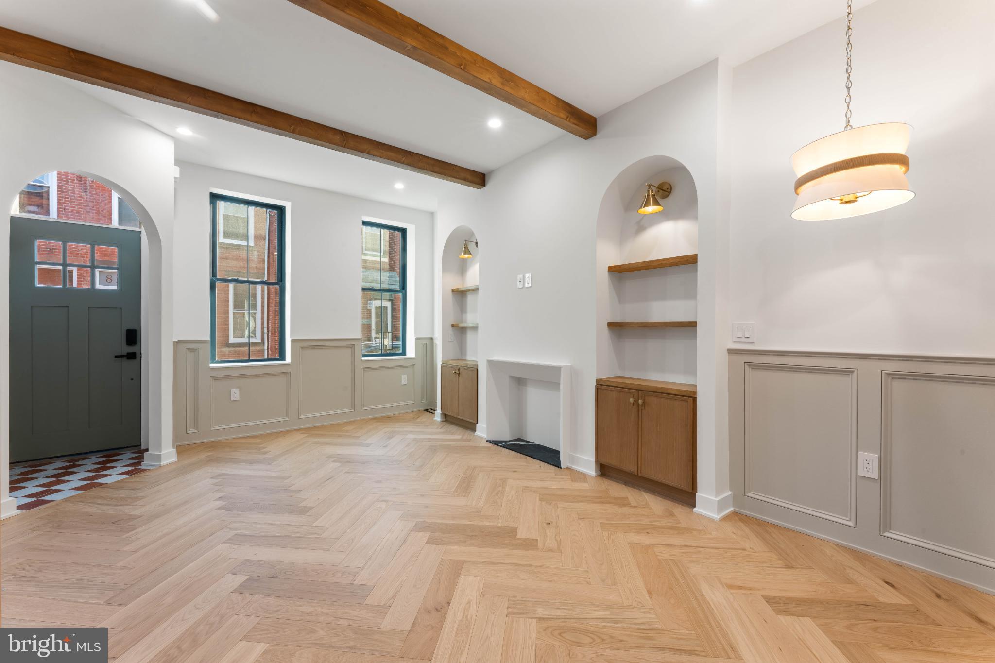 823 Mercer Street Philadelphia, PA 19125 - Photo 4 of 37 a view of an empty room with window and cabinet