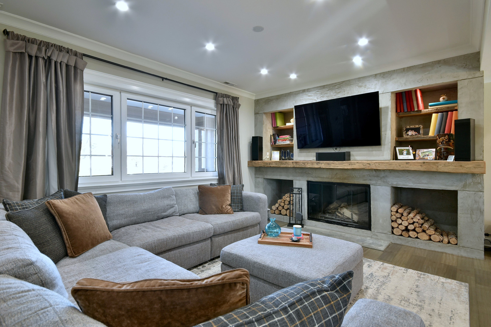 1237 Huber Lane Glenview, IL 60025 - Photo 13 of 49 a living room with furniture a flat screen tv and a fireplace
