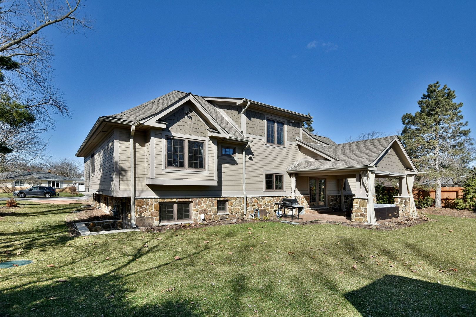 1237 Huber Lane Glenview, IL 60025 - Photo 3 of 49 a front view of a house with garden