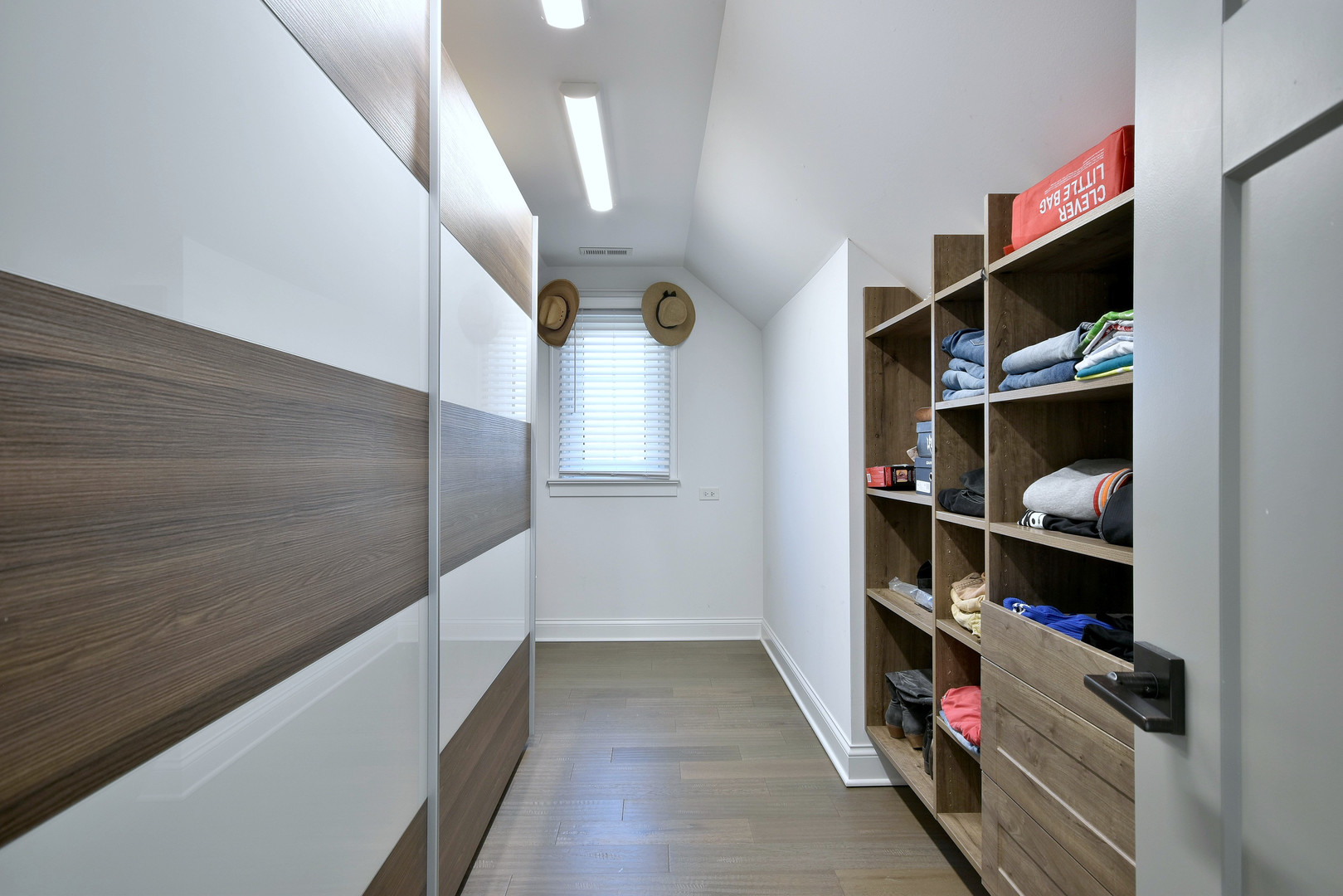 1237 Huber Lane Glenview, IL 60025 - Photo 35 of 49 a view of walk in closet with clothes and shoes