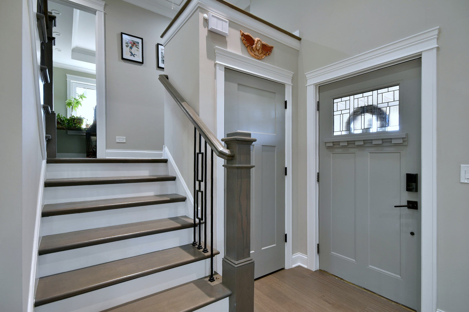 1237 Huber Lane Glenview, IL 60025 - Photo 36 of 49 a view of entryway and hall with wooden floor