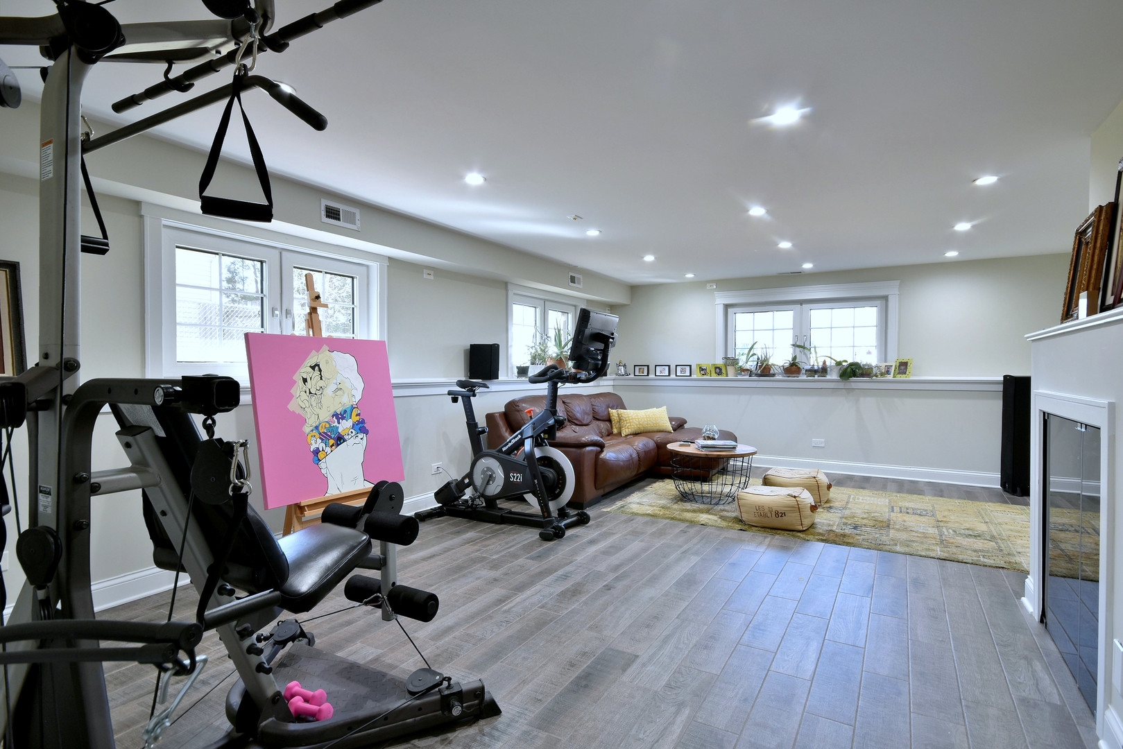 1237 Huber Lane Glenview, IL 60025 - Photo 39 of 49 a room with gym equipment and wooden floor