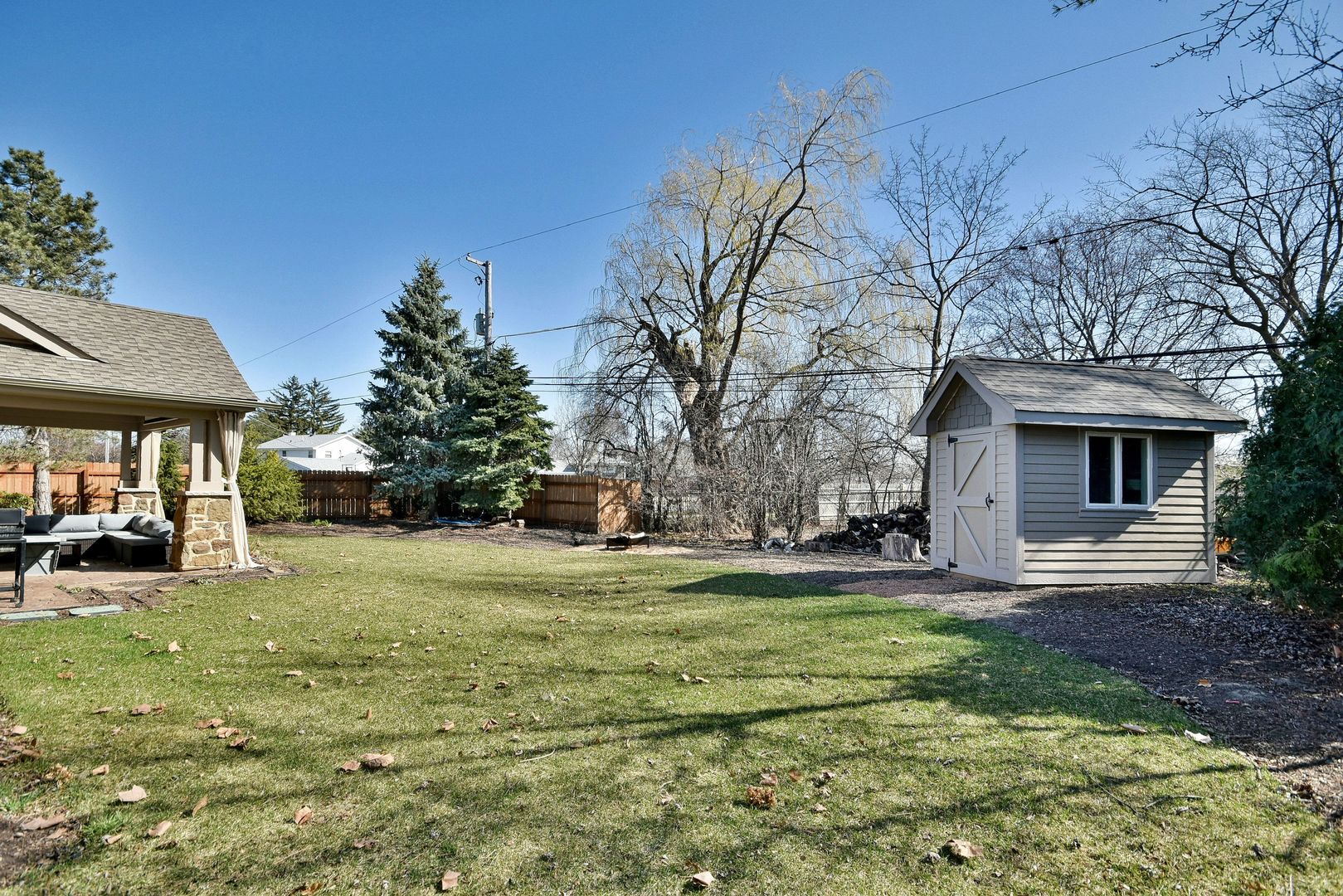 1237 Huber Lane Glenview, IL 60025 - Photo 47 of 49 a view of a house with a yard and sitting area