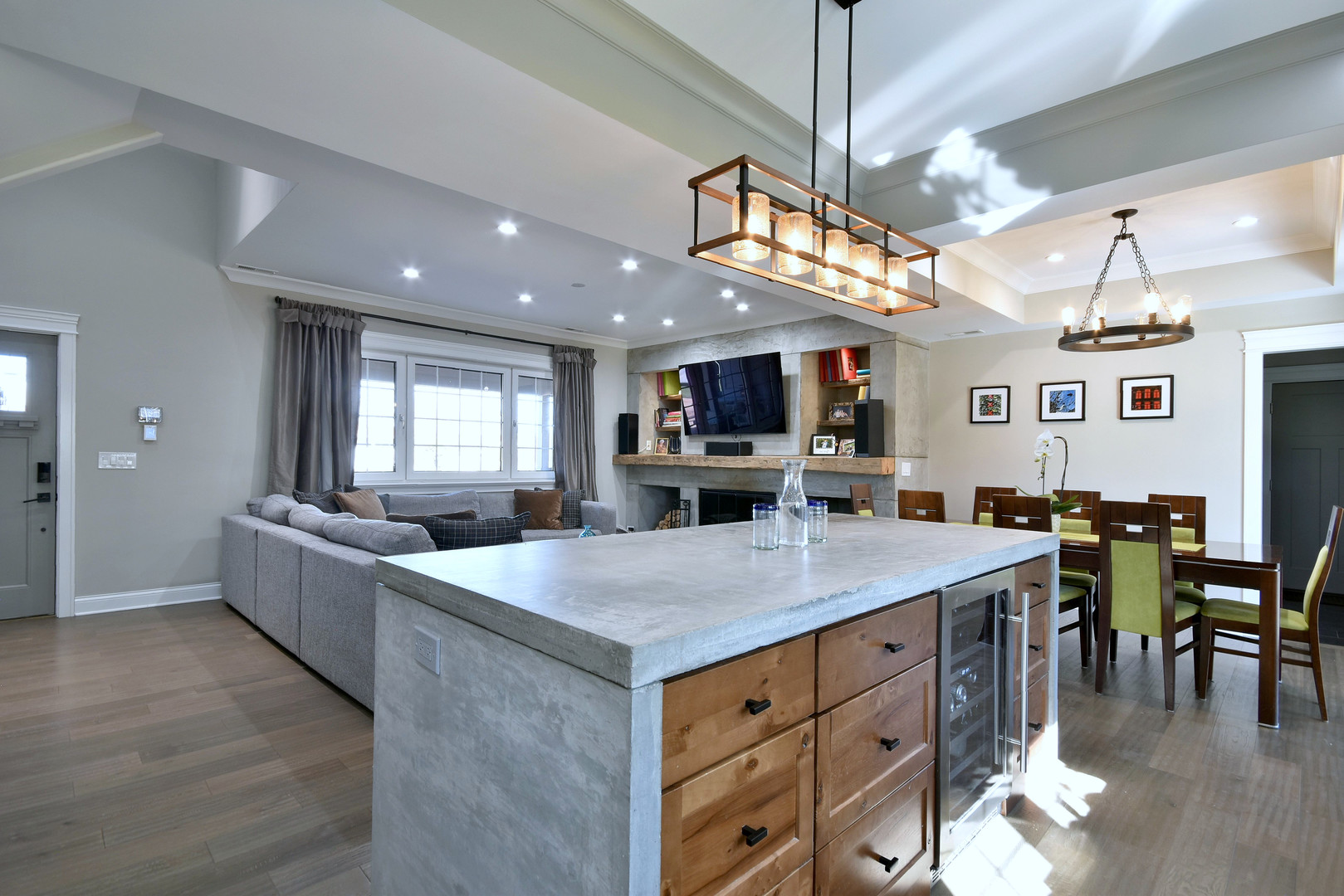 1237 Huber Lane Glenview, IL 60025 - Photo 8 of 49 a kitchen with stainless steel appliances kitchen island granite countertop a stove and a view of living room