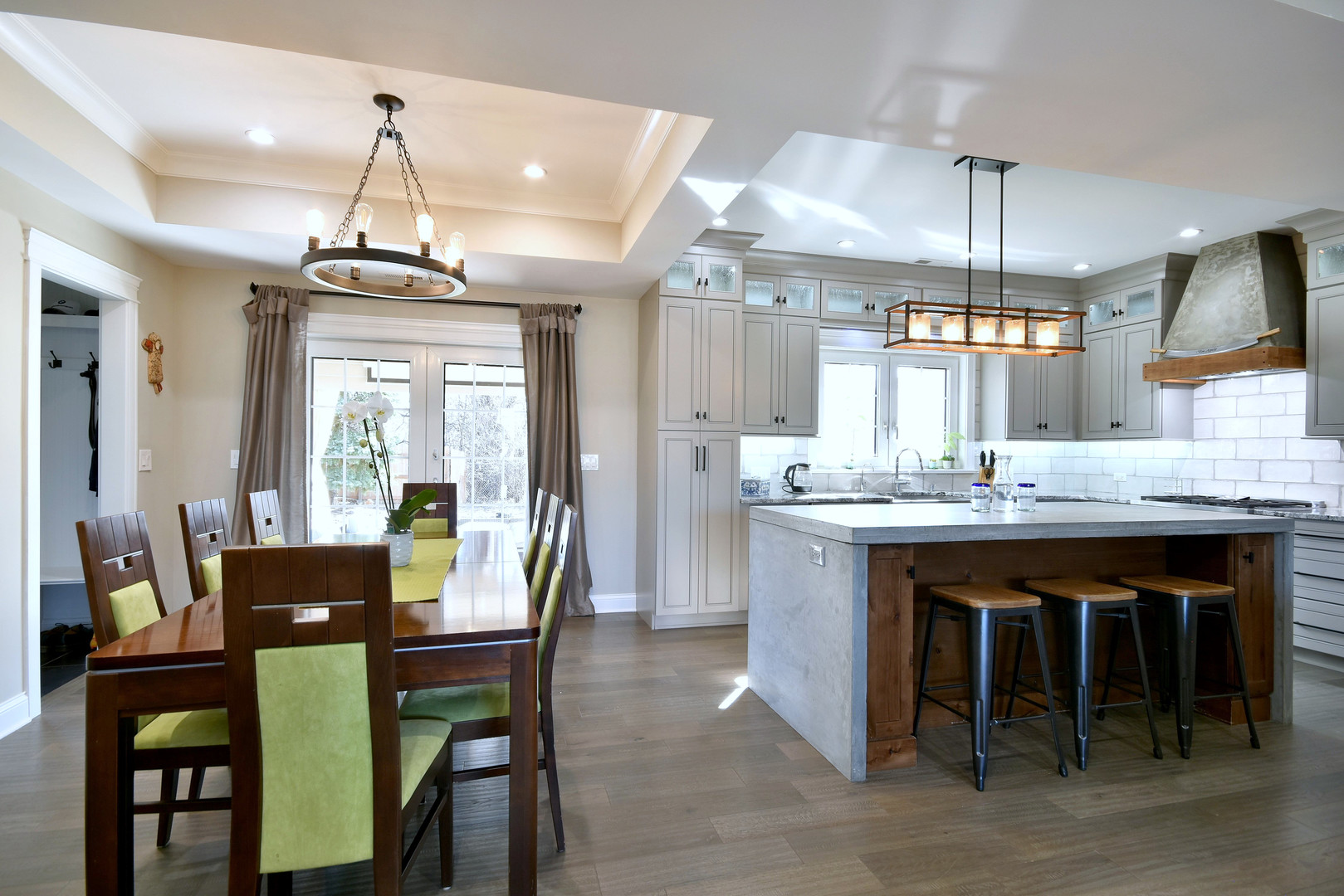 1237 Huber Lane Glenview, IL 60025 - Photo 9 of 49 a large kitchen with a table and chairs