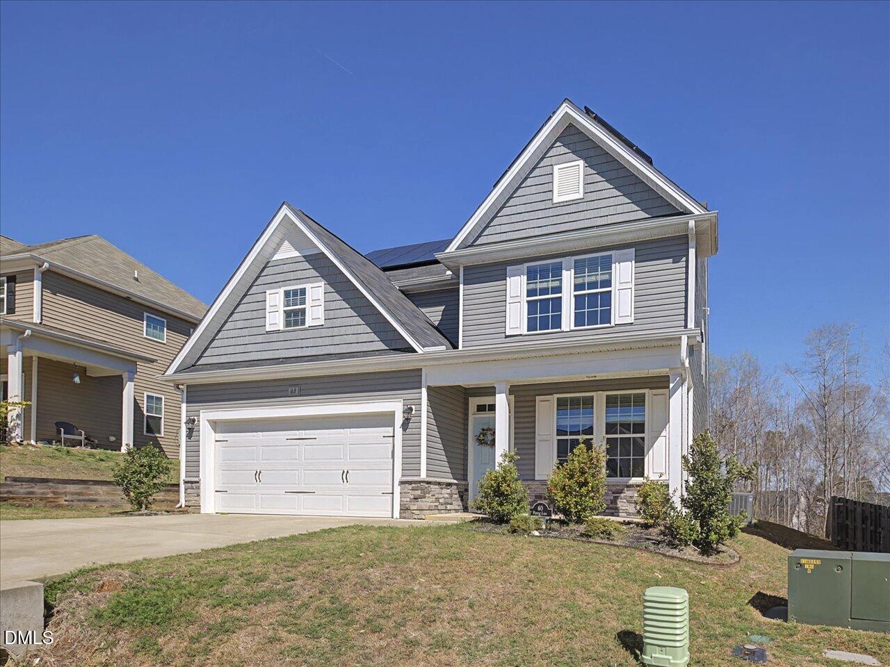 60 Pepper Lane Garner, NC 27529 - Photo 2 of 70 front view of a house with a yard