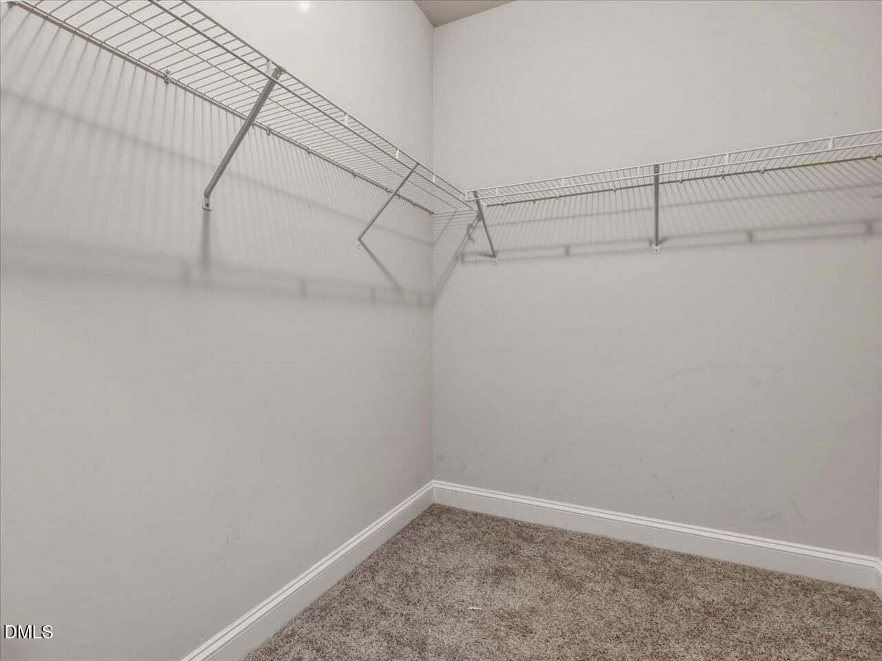 60 Pepper Lane Garner, NC 27529 - Photo 37 of 70 a view of a room with racks on the wall