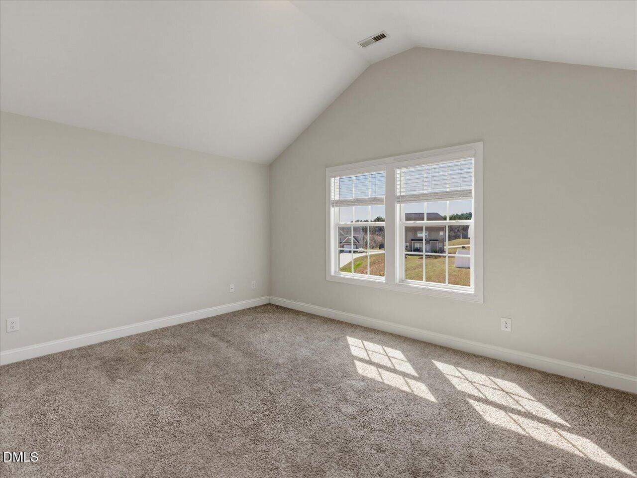 60 Pepper Lane Garner, NC 27529 - Photo 46 of 70 a view of an empty room with a window