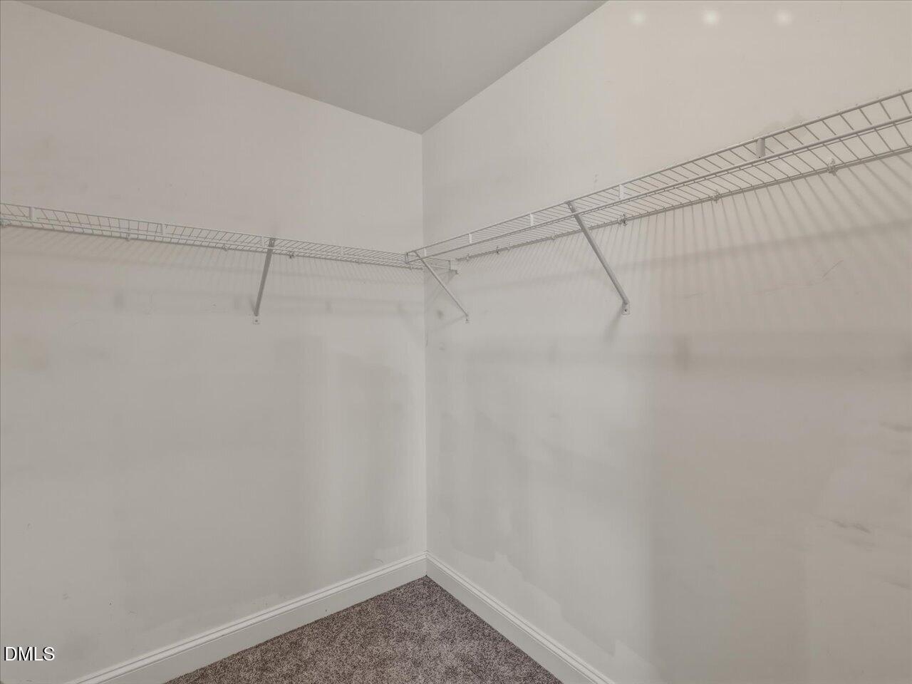 60 Pepper Lane Garner, NC 27529 - Photo 48 of 70 a view of a room with racks on the wall