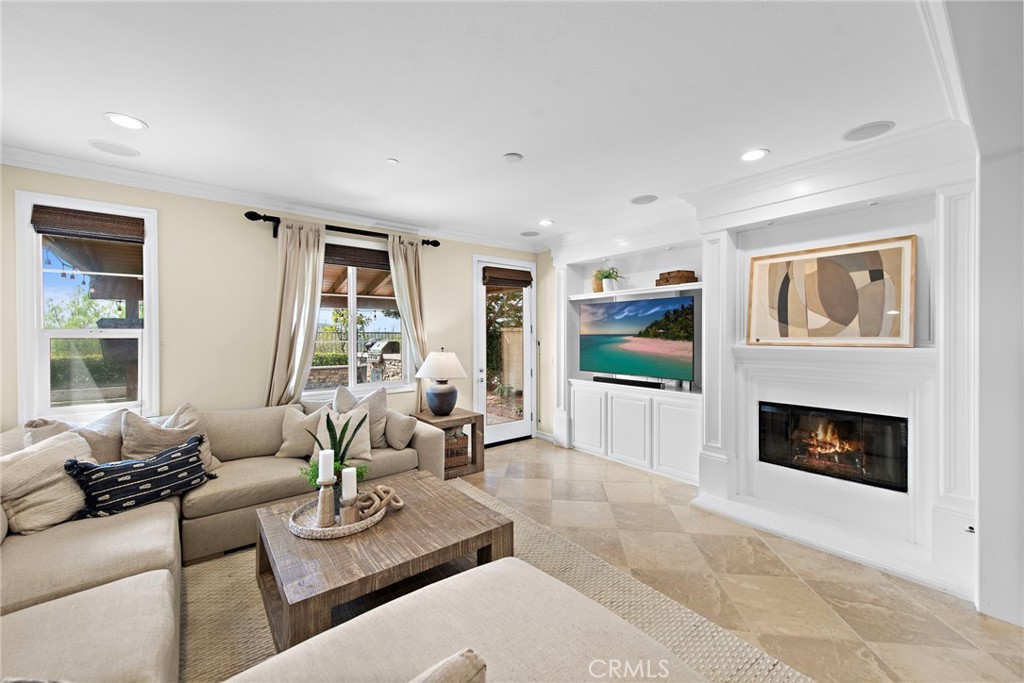 21 Via Cristobal San Clemente, CA 92673 - Photo 12 of 47 a living room with furniture fireplace and flat screen tv