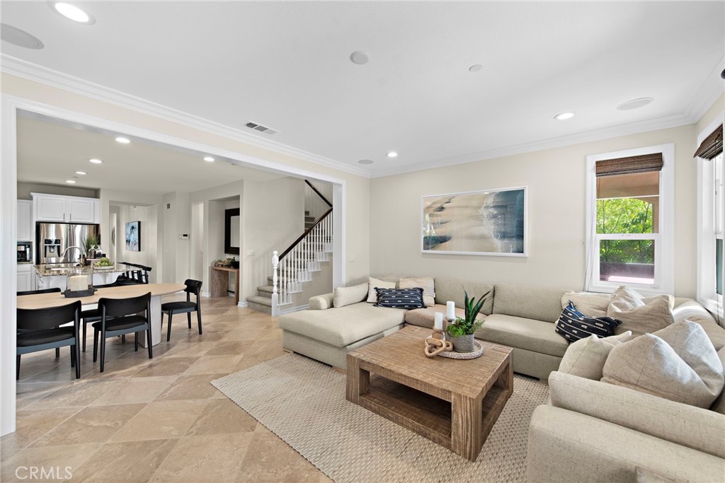 21 Via Cristobal San Clemente, CA 92673 - Photo 13 of 47 a living room with furniture potted plant and a window