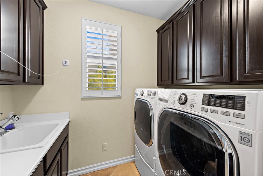 21 Via Cristobal San Clemente, CA 92673 - Photo 16 of 47 a utility room with dryer and washer