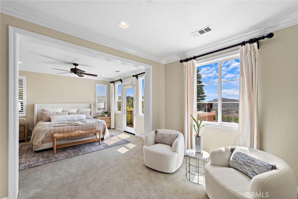 21 Via Cristobal San Clemente, CA 92673 - Photo 17 of 47 a spacious bedroom with a bed and a couch