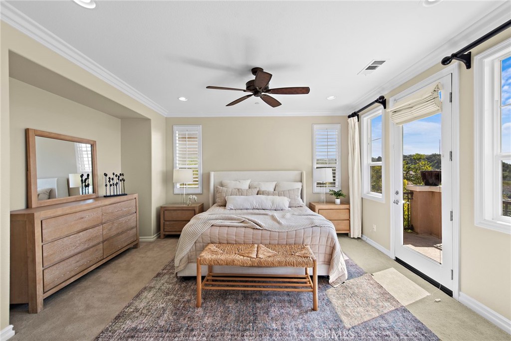 21 Via Cristobal San Clemente, CA 92673 - Photo 18 of 47 a bed room with a bed and a chandelier