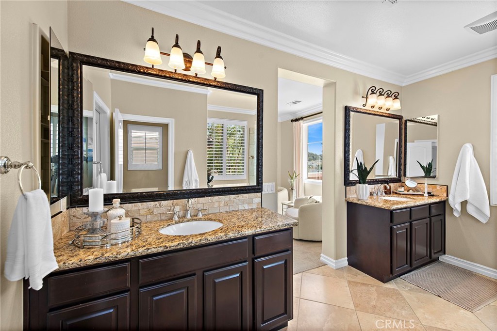 21 Via Cristobal San Clemente, CA 92673 - Photo 20 of 47 a bathroom with a granite countertop sink and a mirror