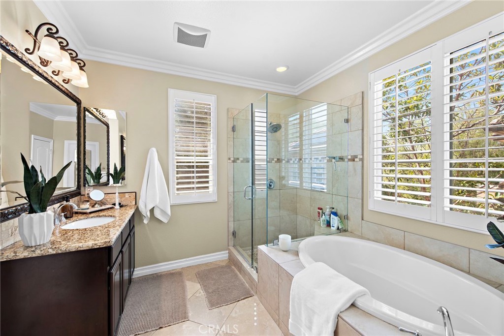21 Via Cristobal San Clemente, CA 92673 - Photo 21 of 47 a spacious bathroom with a granite countertop tub and a sink