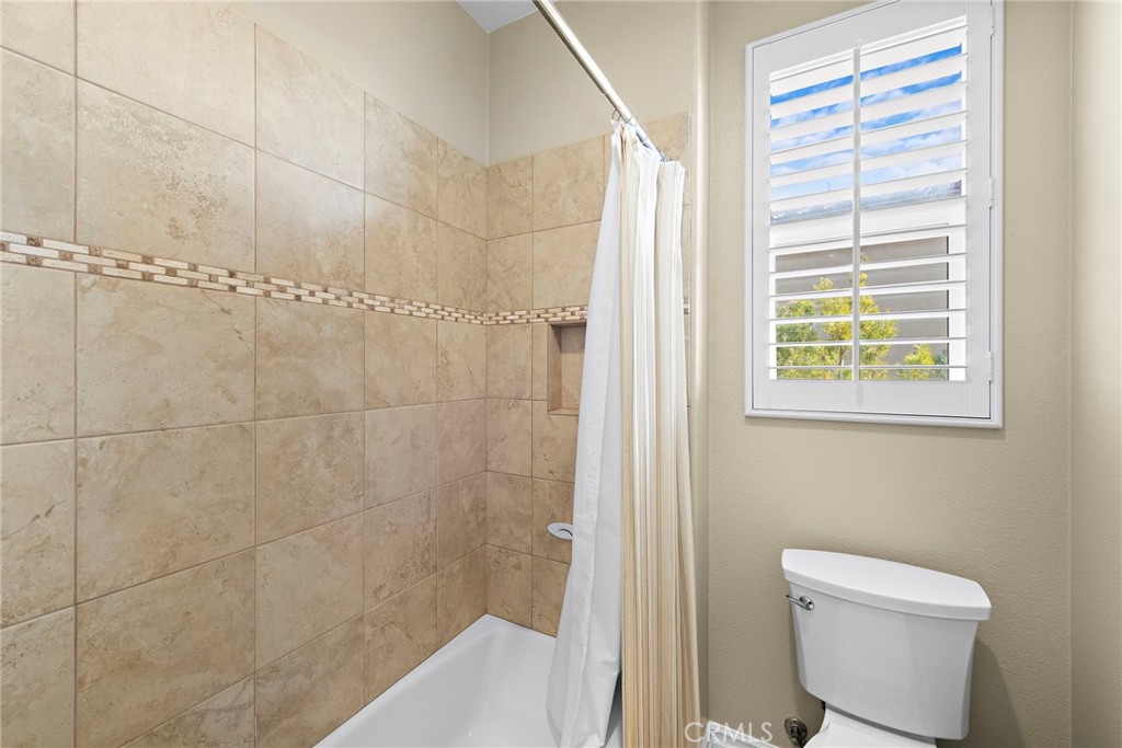 21 Via Cristobal San Clemente, CA 92673 - Photo 23 of 47 a bathroom with a toilet and a shower