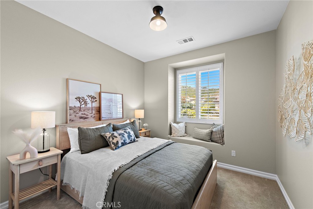 21 Via Cristobal San Clemente, CA 92673 - Photo 25 of 47 a bedroom with a bed and a window