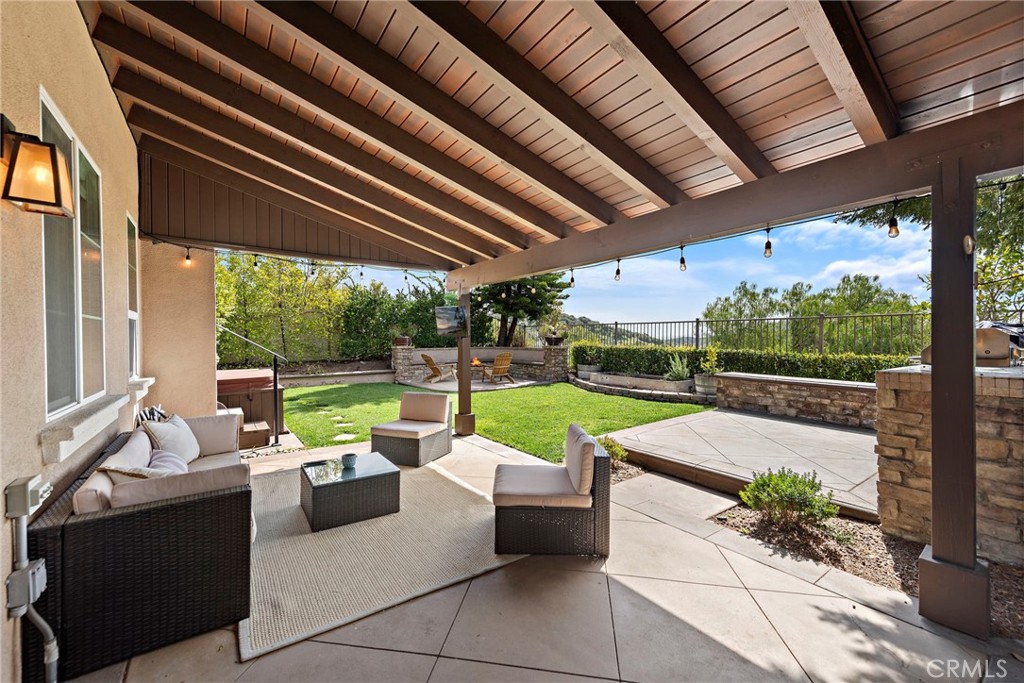 21 Via Cristobal San Clemente, CA 92673 - Photo 28 of 47 a view of a patio with couches chairs and a yard