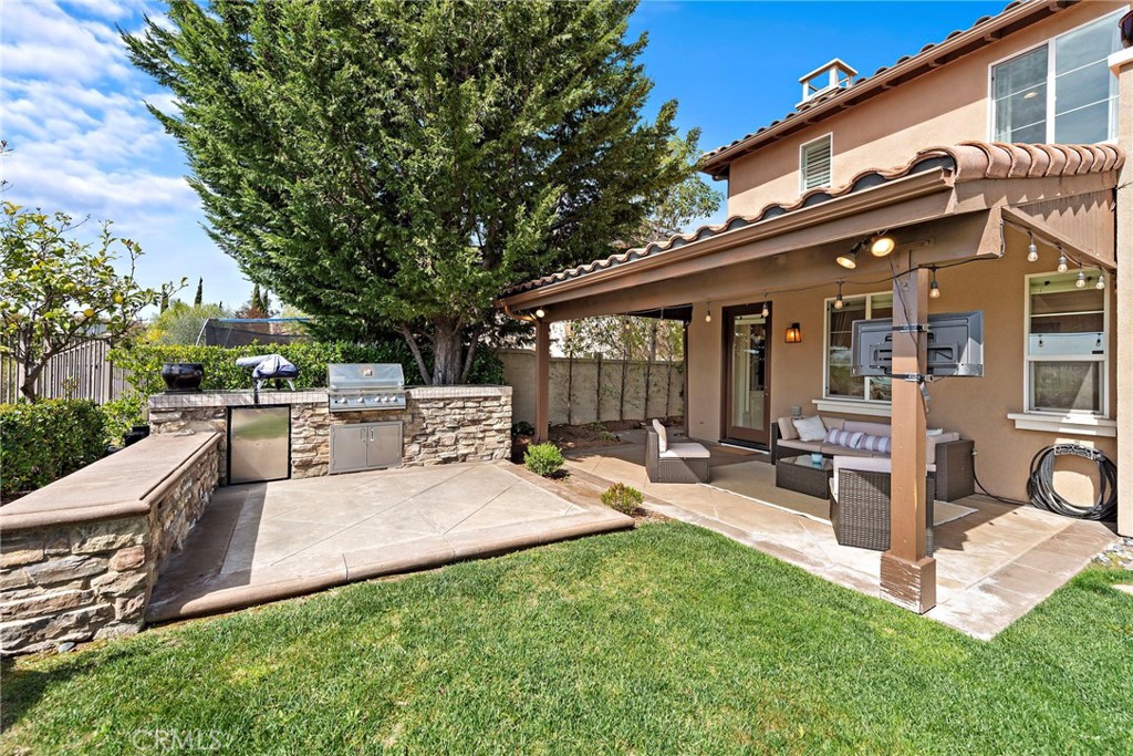 21 Via Cristobal San Clemente, CA 92673 - Photo 29 of 47 a view of backyard of house with outdoor seating and green space