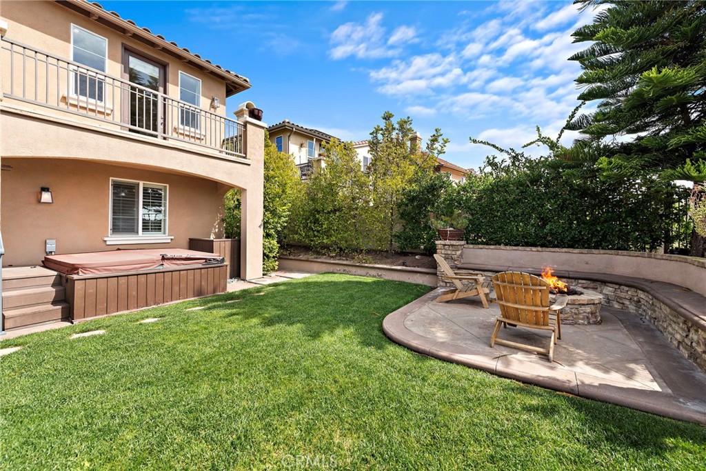 21 Via Cristobal San Clemente, CA 92673 - Photo 30 of 47 a view of a patio with table and chairs and wooden fence