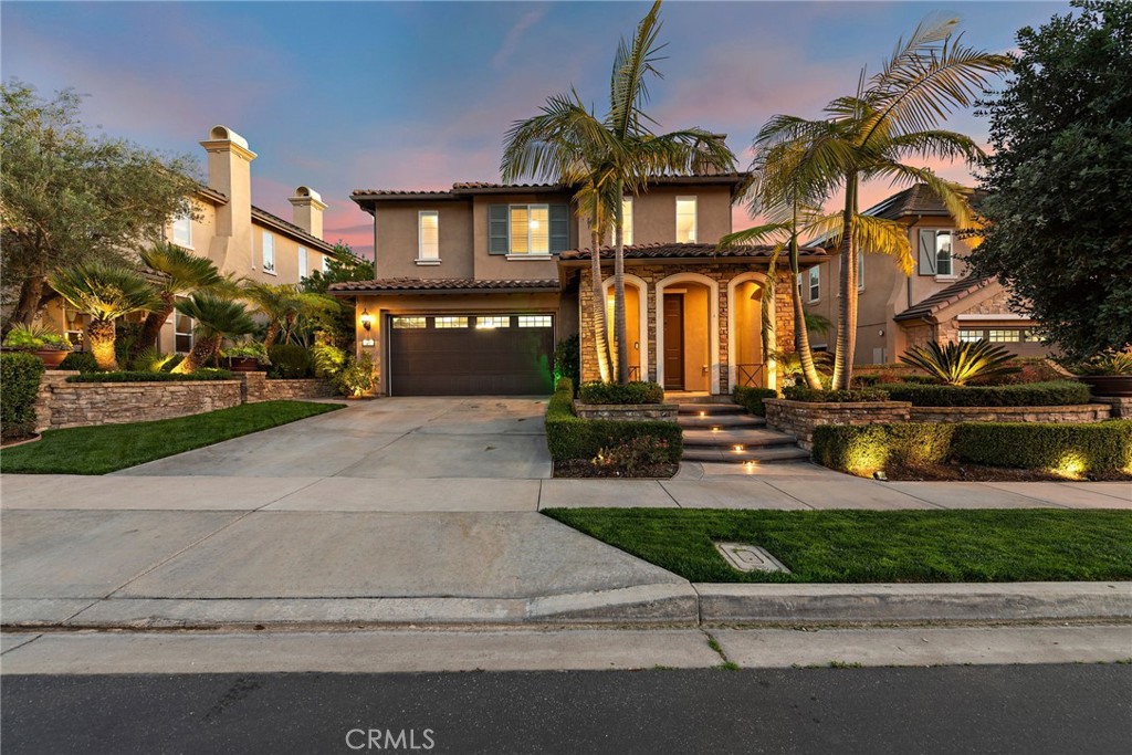 21 Via Cristobal San Clemente, CA 92673 - Photo 3 of 47 a front view of a house with a yard and garage