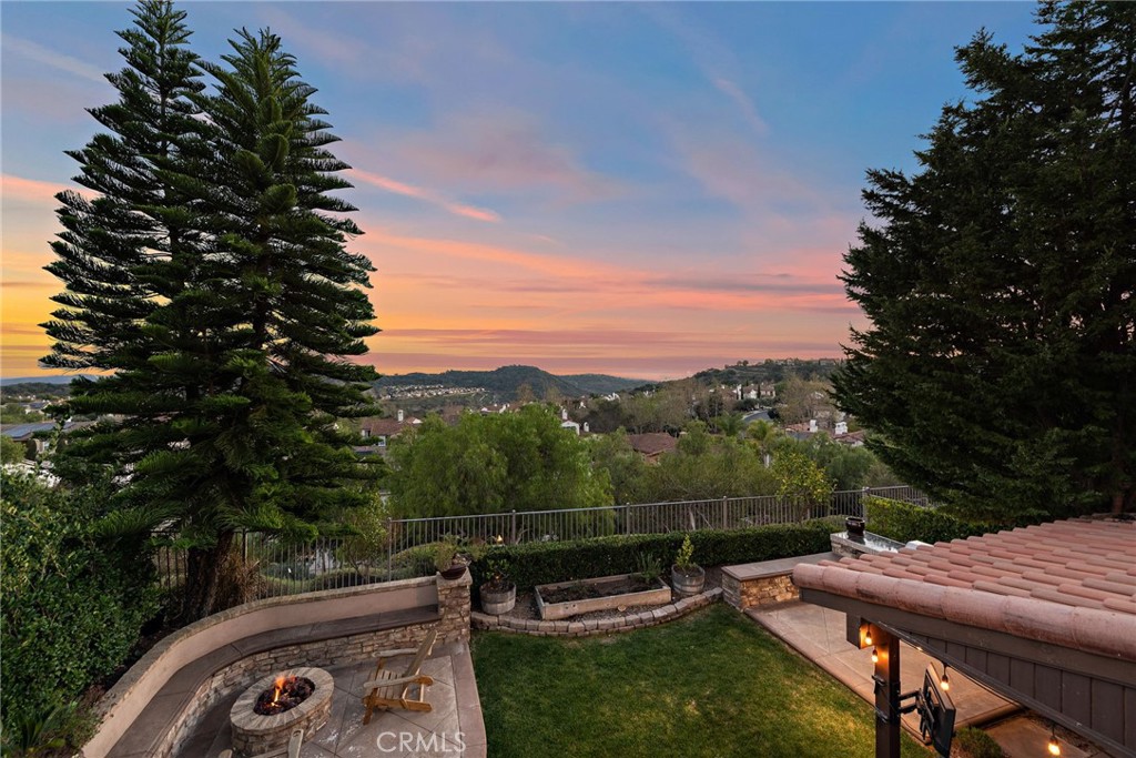 21 Via Cristobal San Clemente, CA 92673 - Photo 33 of 47 a view of a chairs and table in backyard
