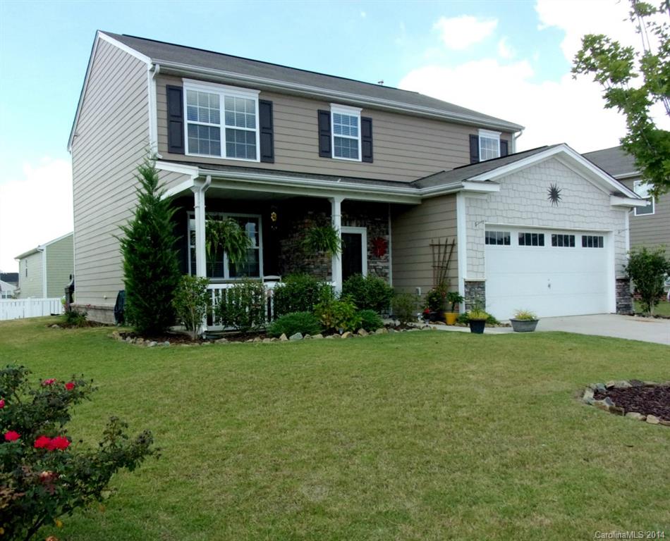 1019 Green Terra Road Indian Trail, NC 28079 - Photo 1 of 20 a front view of a house with garden