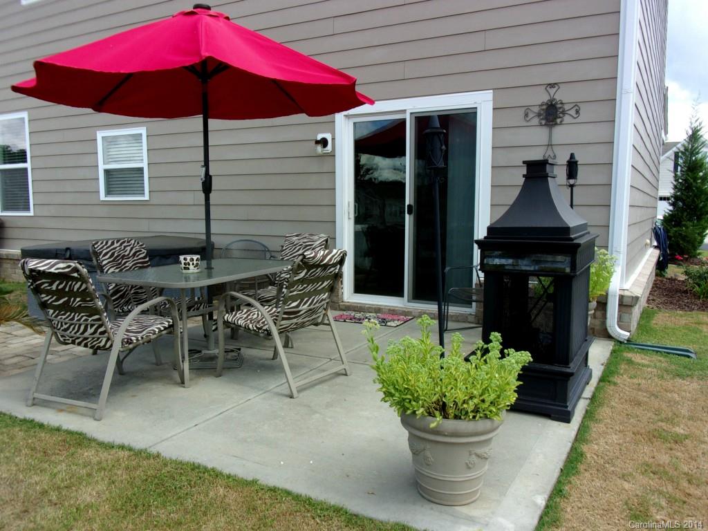1019 Green Terra Road Indian Trail, NC 28079 - Photo 17 of 20 a view of a patio with chairs and potted plants