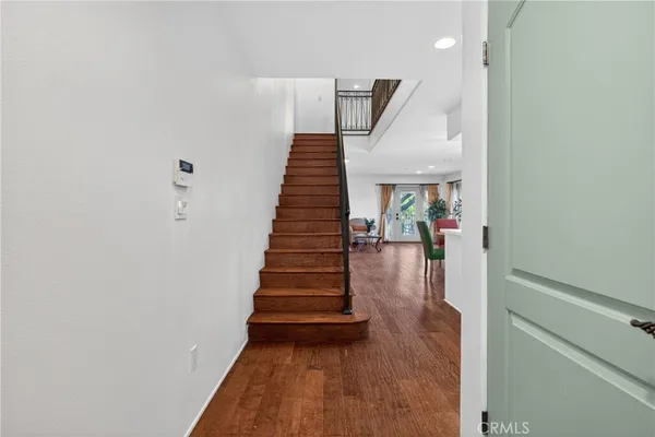 a kitchen that has a sink and a stove in it