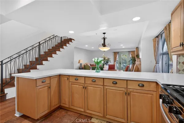 a view of balcony with furniture and wooden deck