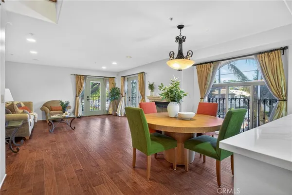 a view of a pathway of a house with wooden floor
