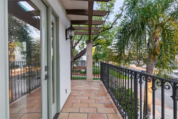 a bathroom with a double vanity sink toilet mirror and shower