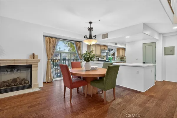 an empty room with a window and wooden floor