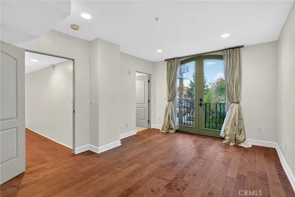 a view of a house with backyard and patio