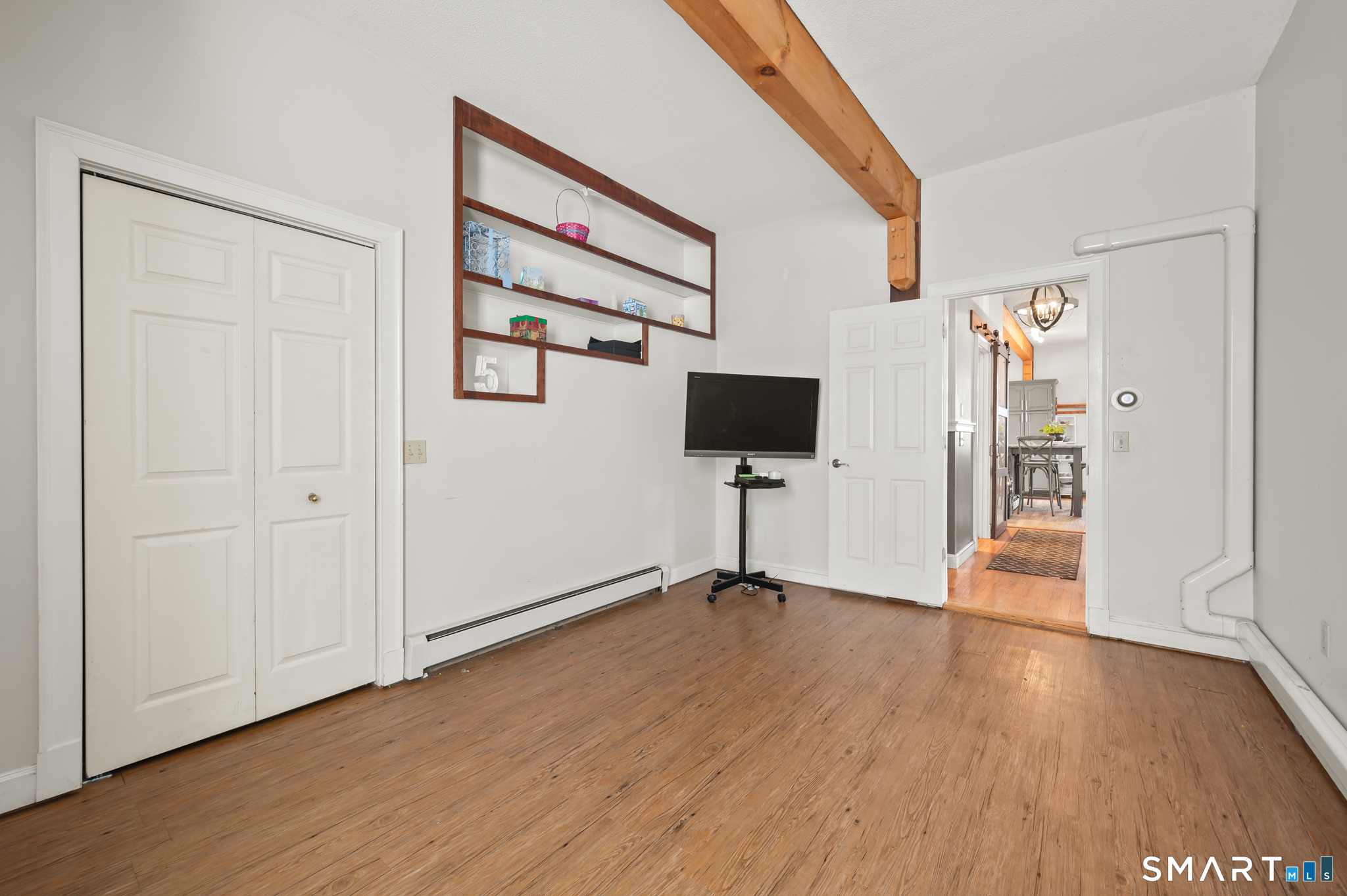278 Thompsonville Road Suffield, CT 06078 - Photo 14 of 38 a view of empty room with wooden floor