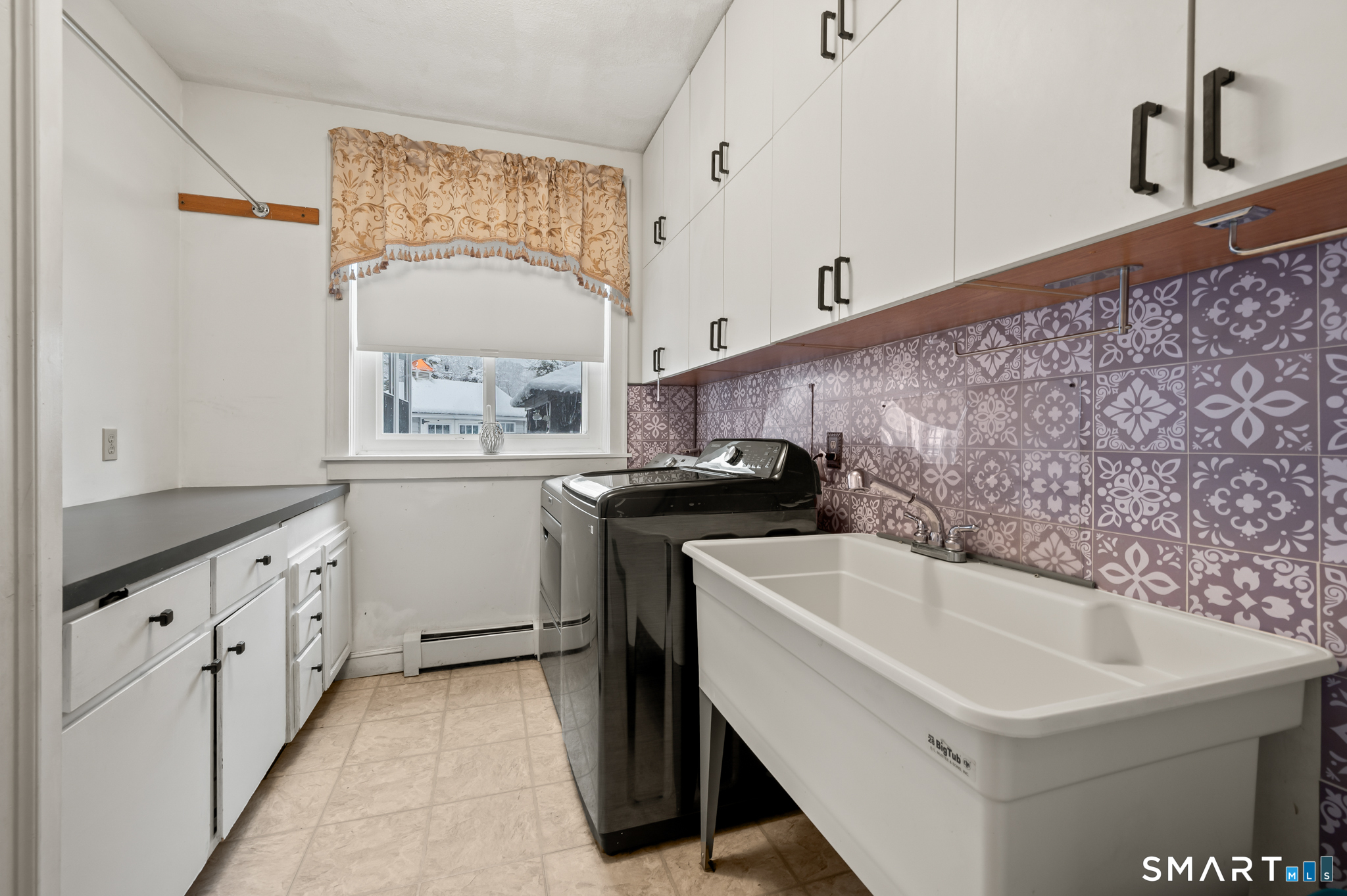 278 Thompsonville Road Suffield, CT 06078 - Photo 15 of 38 a bathroom with a sink and a bathtub