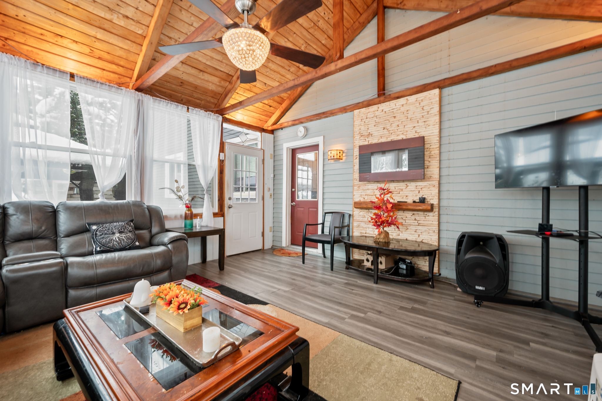 278 Thompsonville Road Suffield, CT 06078 - Photo 18 of 38 a living room with furniture and a fireplace