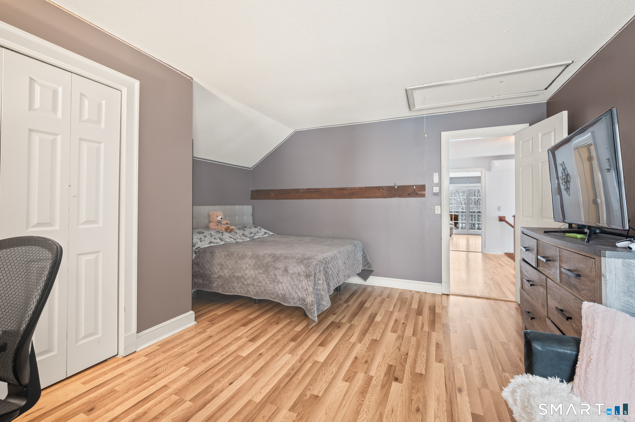 278 Thompsonville Road Suffield, CT 06078 - Photo 25 of 38 a bedroom with a bed and a flat screen tv