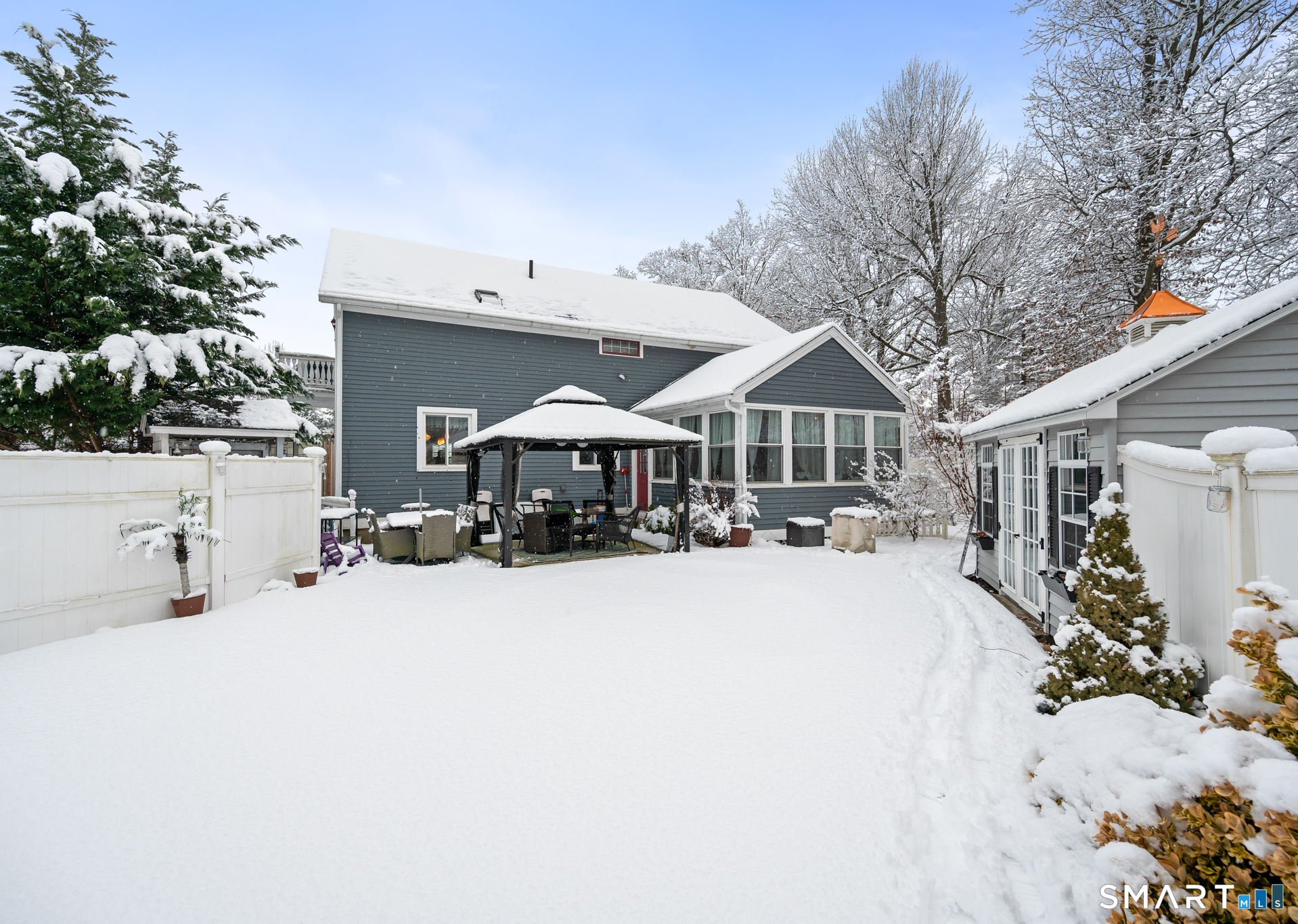 278 Thompsonville Road Suffield, CT 06078 - Photo 37 of 38 a front view of a house with yard porch and outdoor seating
