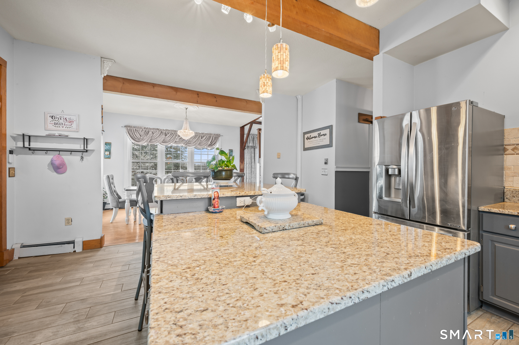 278 Thompsonville Road Suffield, CT 06078 - Photo 6 of 38 a kitchen with stainless steel appliances granite countertop a refrigerator and a stove top oven