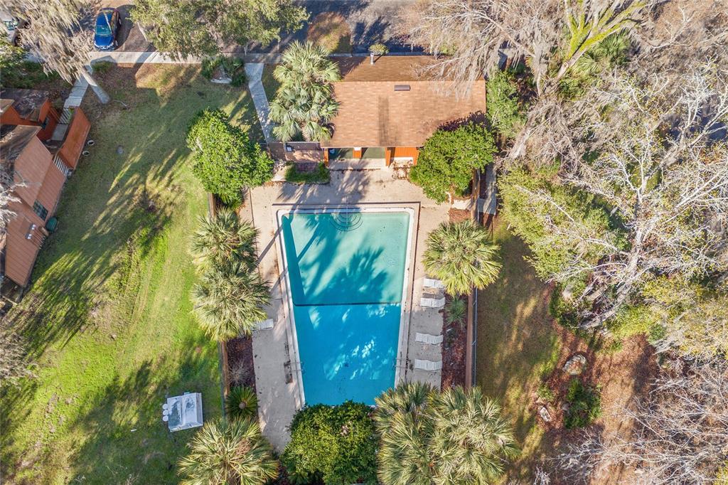 900 Southwest 62nd Boulevard, Unit L79 Gainesville, FL 32607 - Photo 2 of 24 an aerial view of a house with a yard