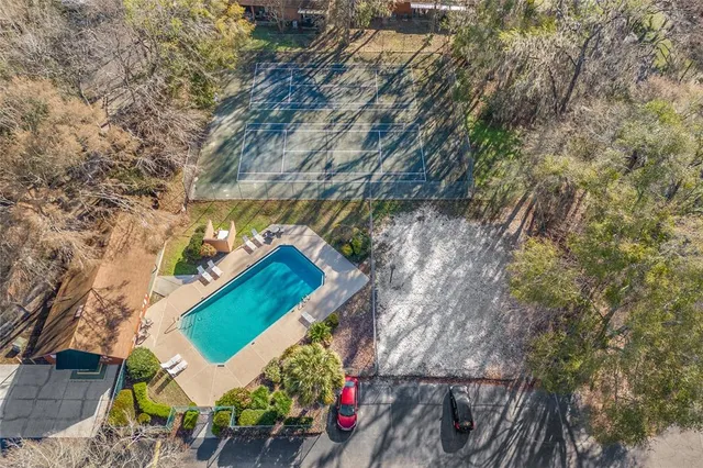 a backyard of a house with outdoor seating