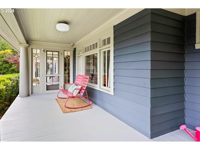 a backyard of a house with seating space