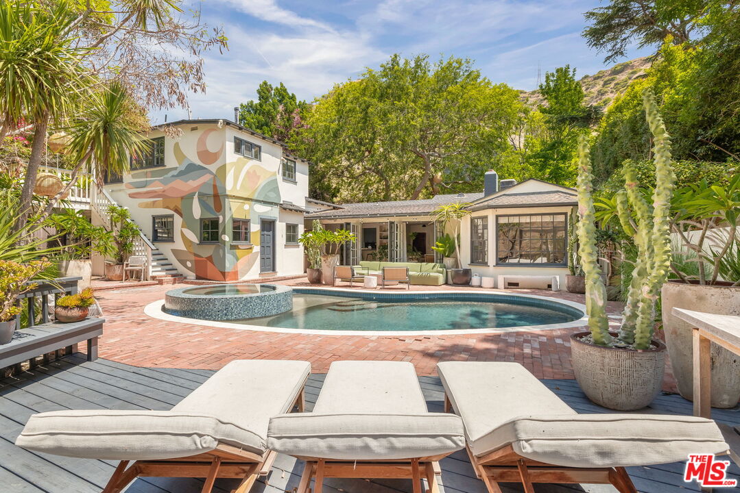 a view of outdoor space yard swimming pool and patio