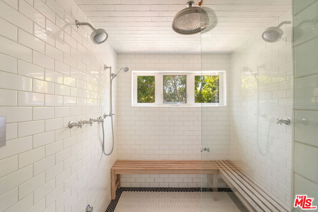 2015 Nichols Canyon Road Los Angeles, CA 90046 - Photo 16 of 27 a bathroom with a bathtub and shower