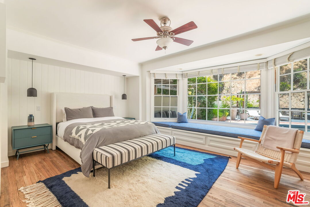 2015 Nichols Canyon Road Los Angeles, CA 90046 - Photo 17 of 27 a bedroom with a large bed and a large window