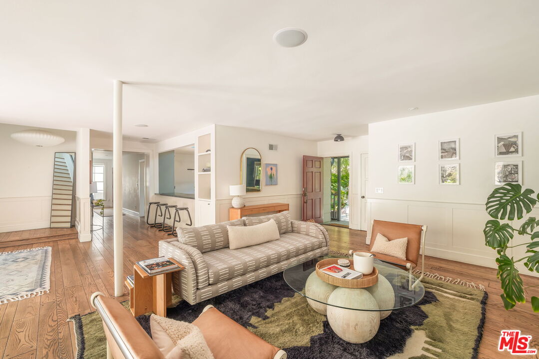 2015 Nichols Canyon Road Los Angeles, CA 90046 - Photo 3 of 27 a living room with furniture and a table
