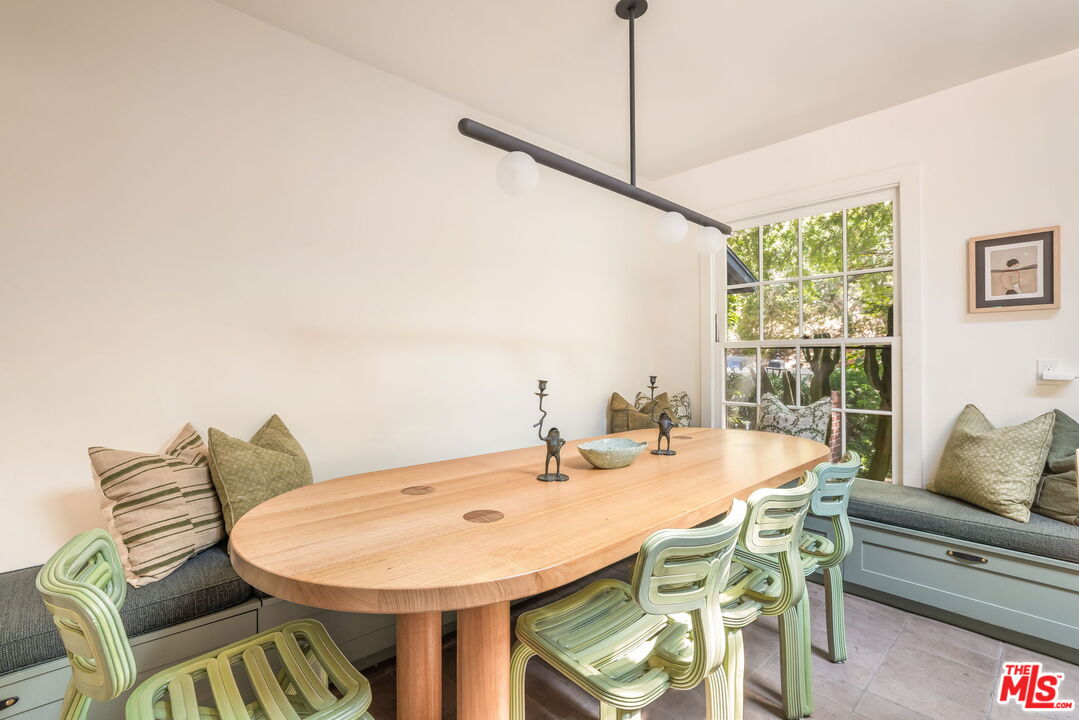 2015 Nichols Canyon Road Los Angeles, CA 90046 - Photo 7 of 27 a view of a dining room with furniture window and outside view